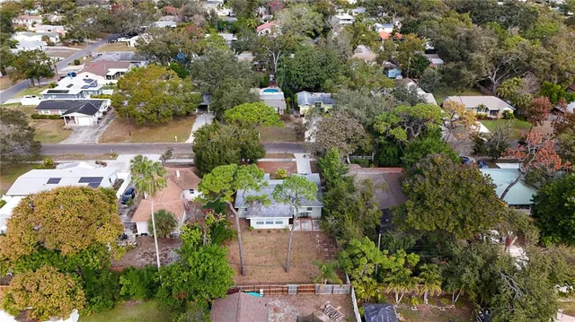 an aerial view of residential house with outdoor space