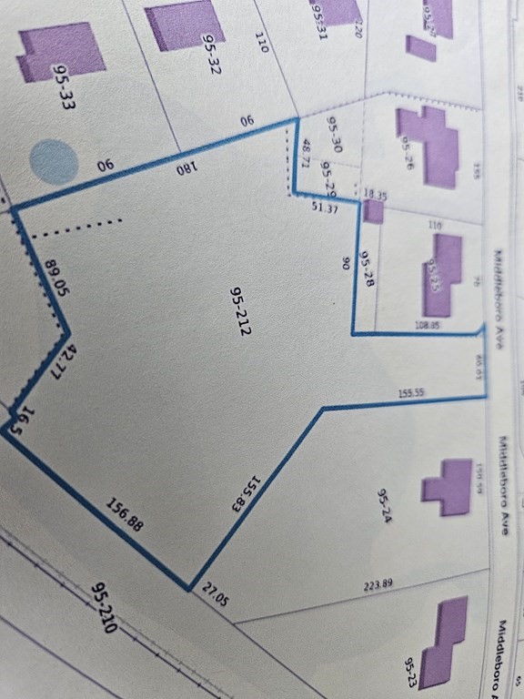 125 R Middleboro Avenue Taunton, MA 02718 - Photo 1 of 2 a view of a refrigerator with white cabinets