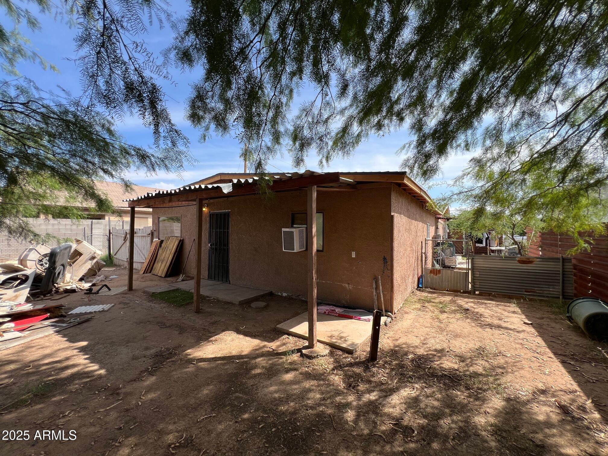 2002 West Lawrence Road Phoenix, AZ 85015 - Photo 13 of 22 a view of a car in front of house