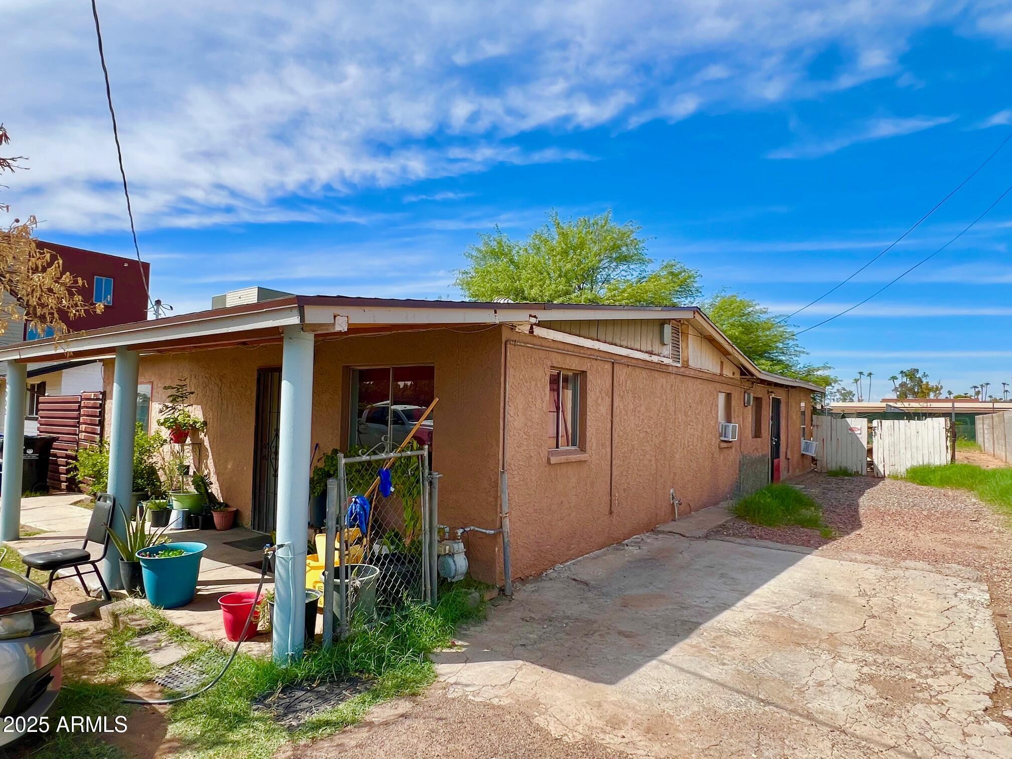 2002 West Lawrence Road Phoenix, AZ 85015 - Photo 3 of 22 a view of a house with patio