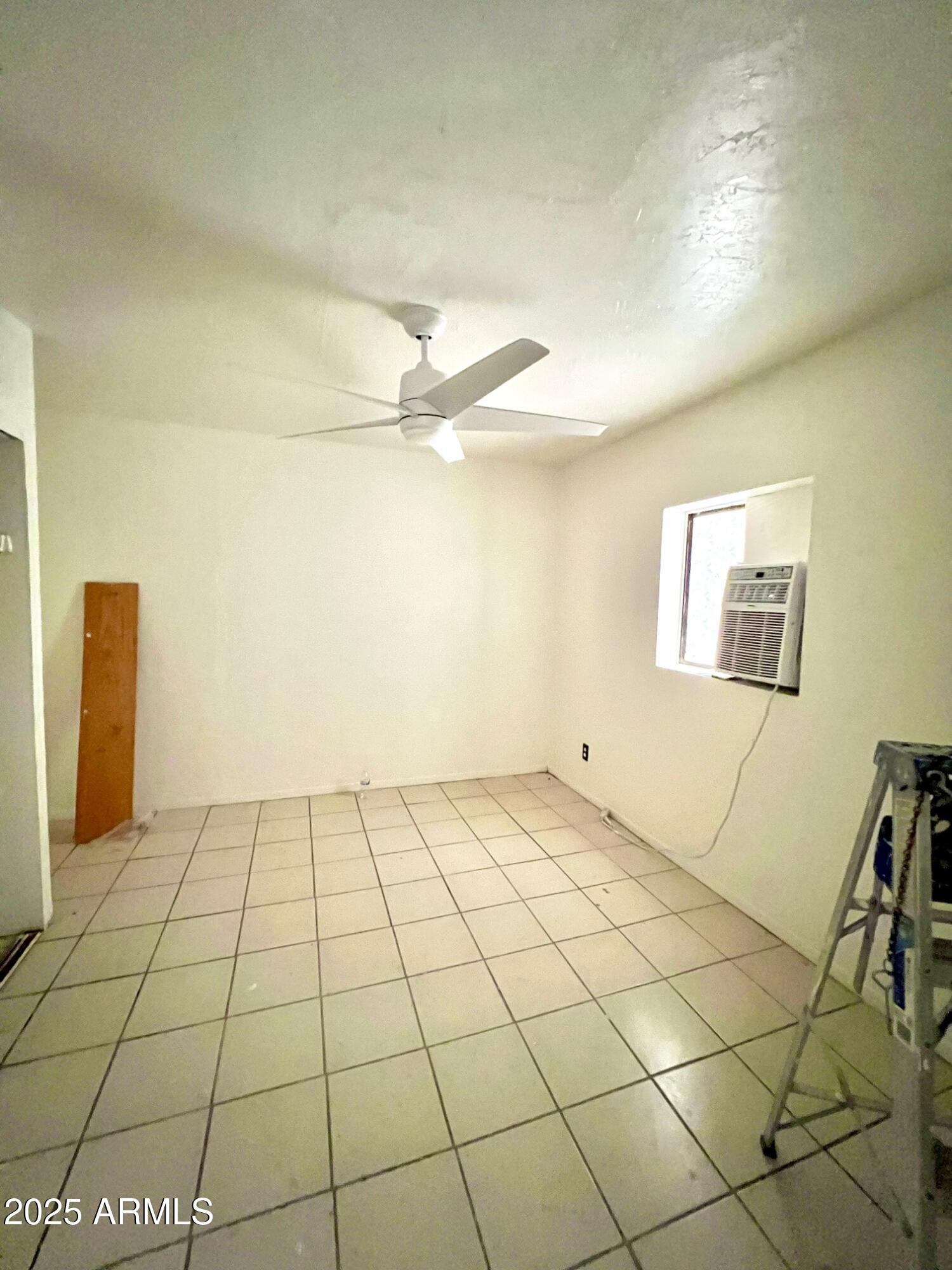 2002 West Lawrence Road Phoenix, AZ 85015 - Photo 9 of 22 a view of an empty room