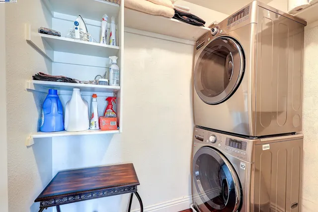 a view of a swimming pool with a table and chairs