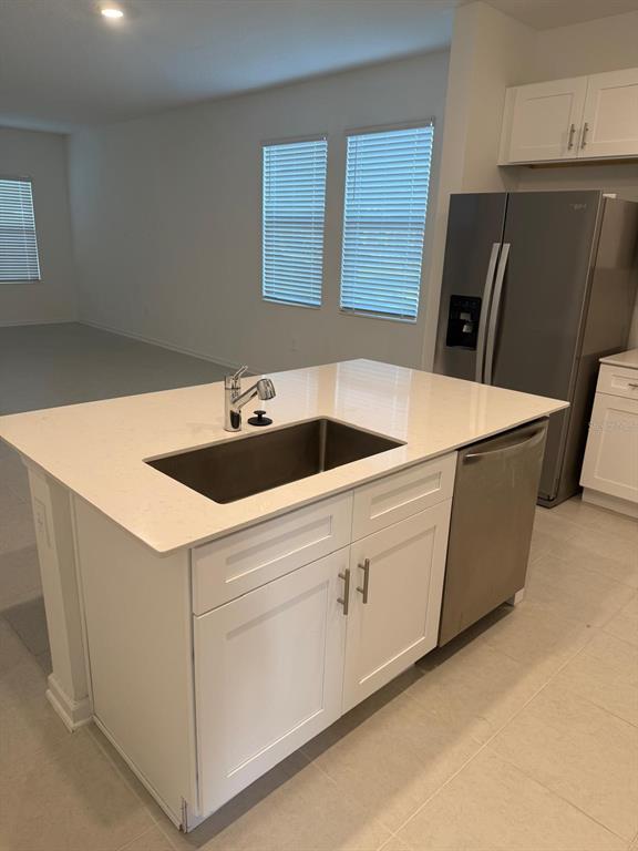 1770 Rider Rain Lane Apopka, FL 32703 - Photo 17 of 86 a utility room with dryer and washer