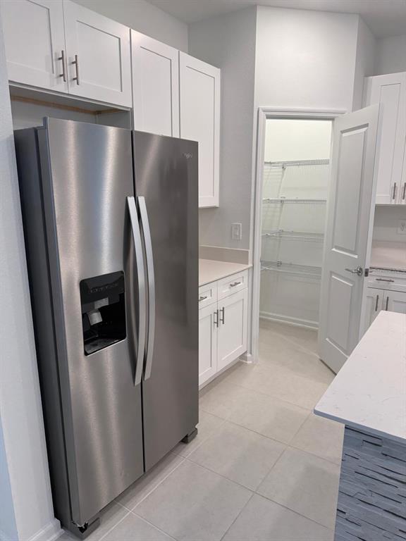 1770 Rider Rain Lane Apopka, FL 32703 - Photo 21 of 86 a metallic refrigerator freezer sitting in a kitchen