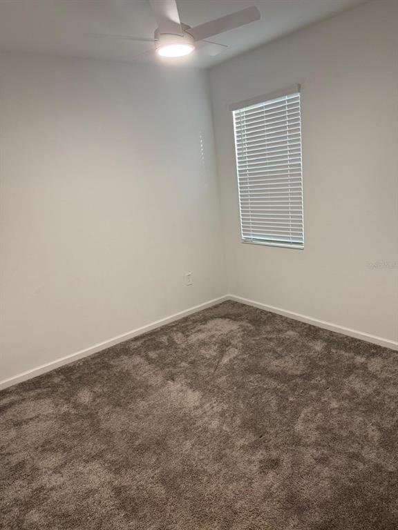 1770 Rider Rain Lane Apopka, FL 32703 - Photo 43 of 86 an empty room with a window