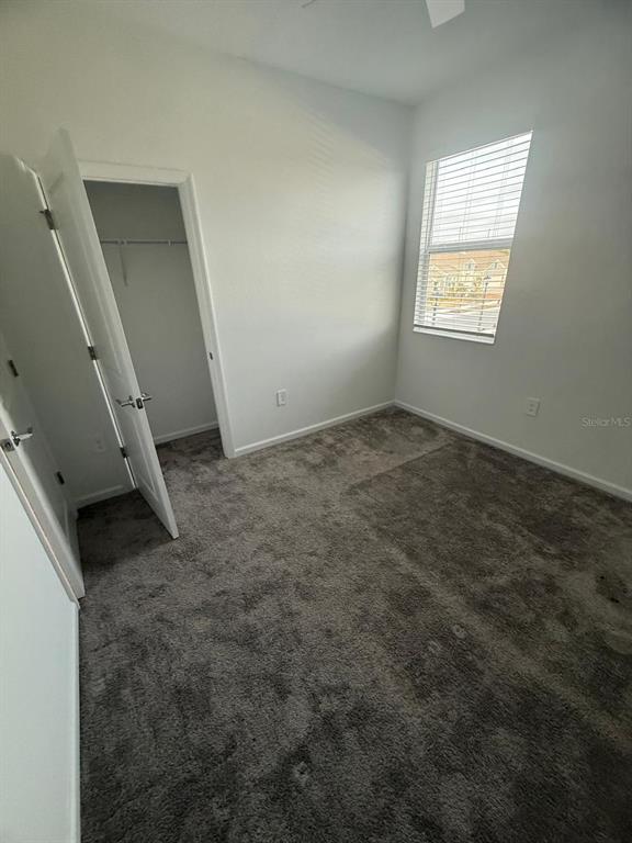 1770 Rider Rain Lane Apopka, FL 32703 - Photo 64 of 86 a view of an empty room and window