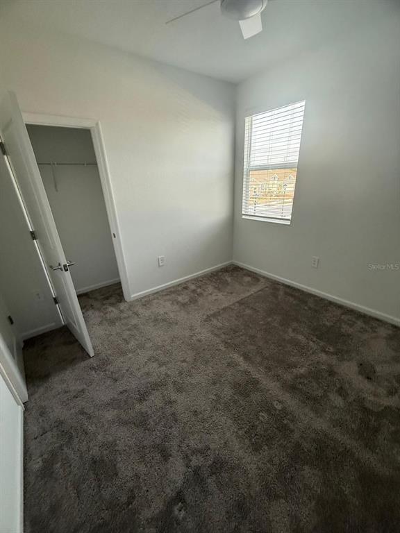 1770 Rider Rain Lane Apopka, FL 32703 - Photo 66 of 86 a view of an empty room with a window