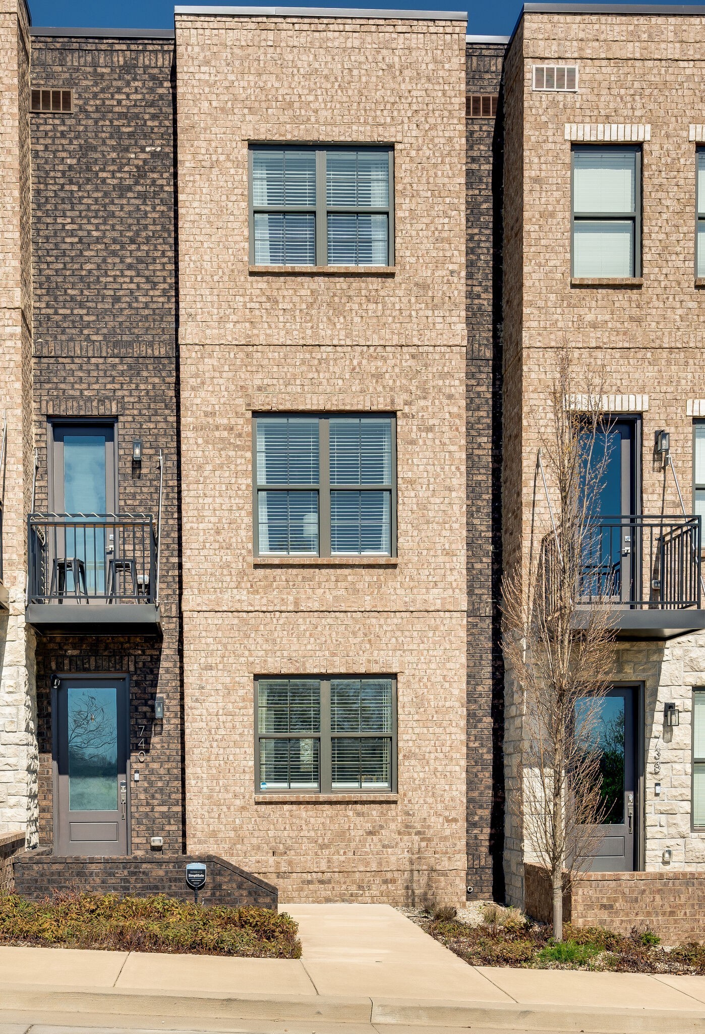 740 Inspiration Boulevard Madison, TN 37115 - Photo 2 of 55 a brick house with a outdoor space