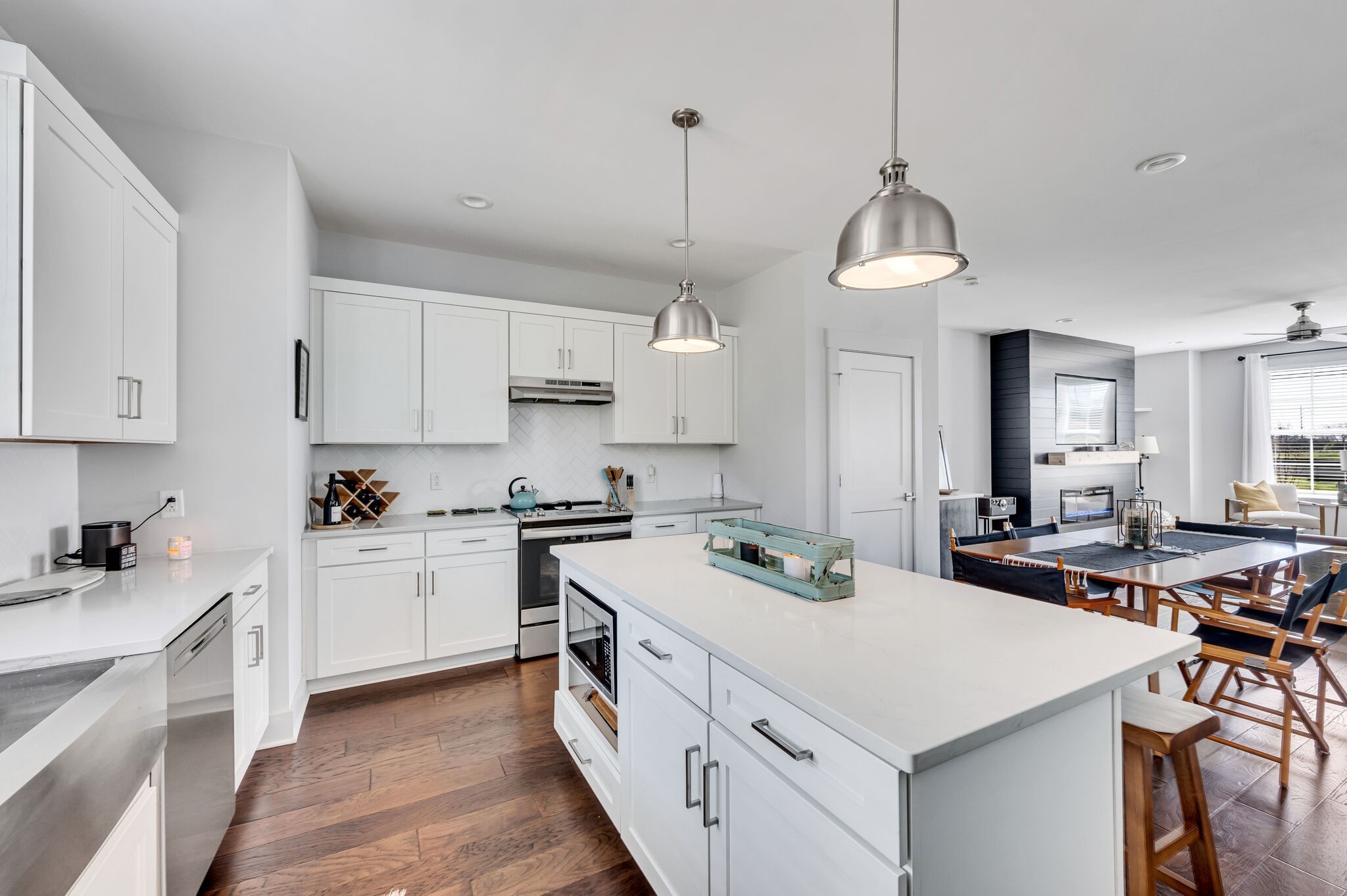 740 Inspiration Boulevard Madison, TN 37115 - Photo 22 of 55 a kitchen that has a lot of cabinets in it and wooden floors