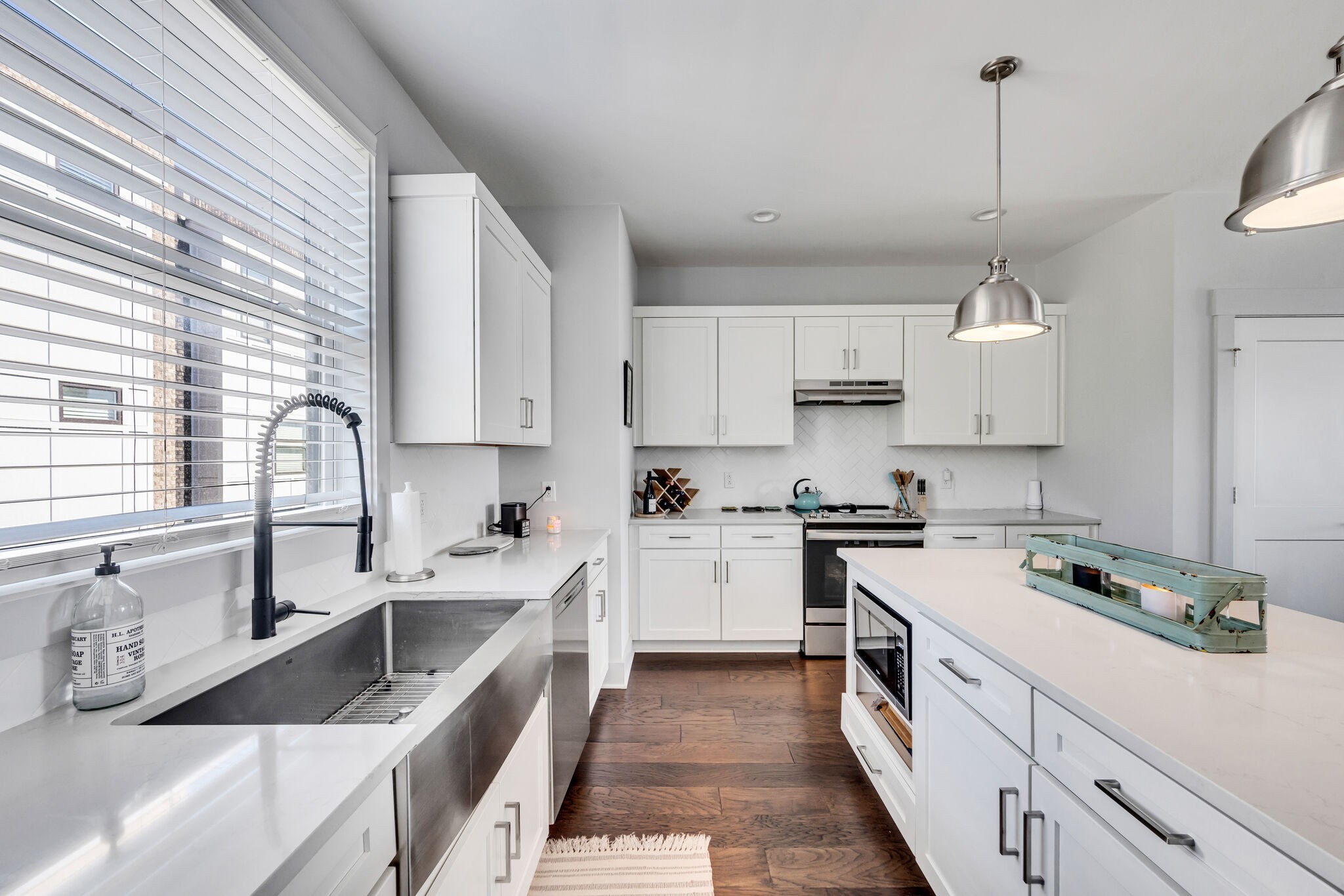 740 Inspiration Boulevard Madison, TN 37115 - Photo 23 of 55 a kitchen with a sink stove and cabinets