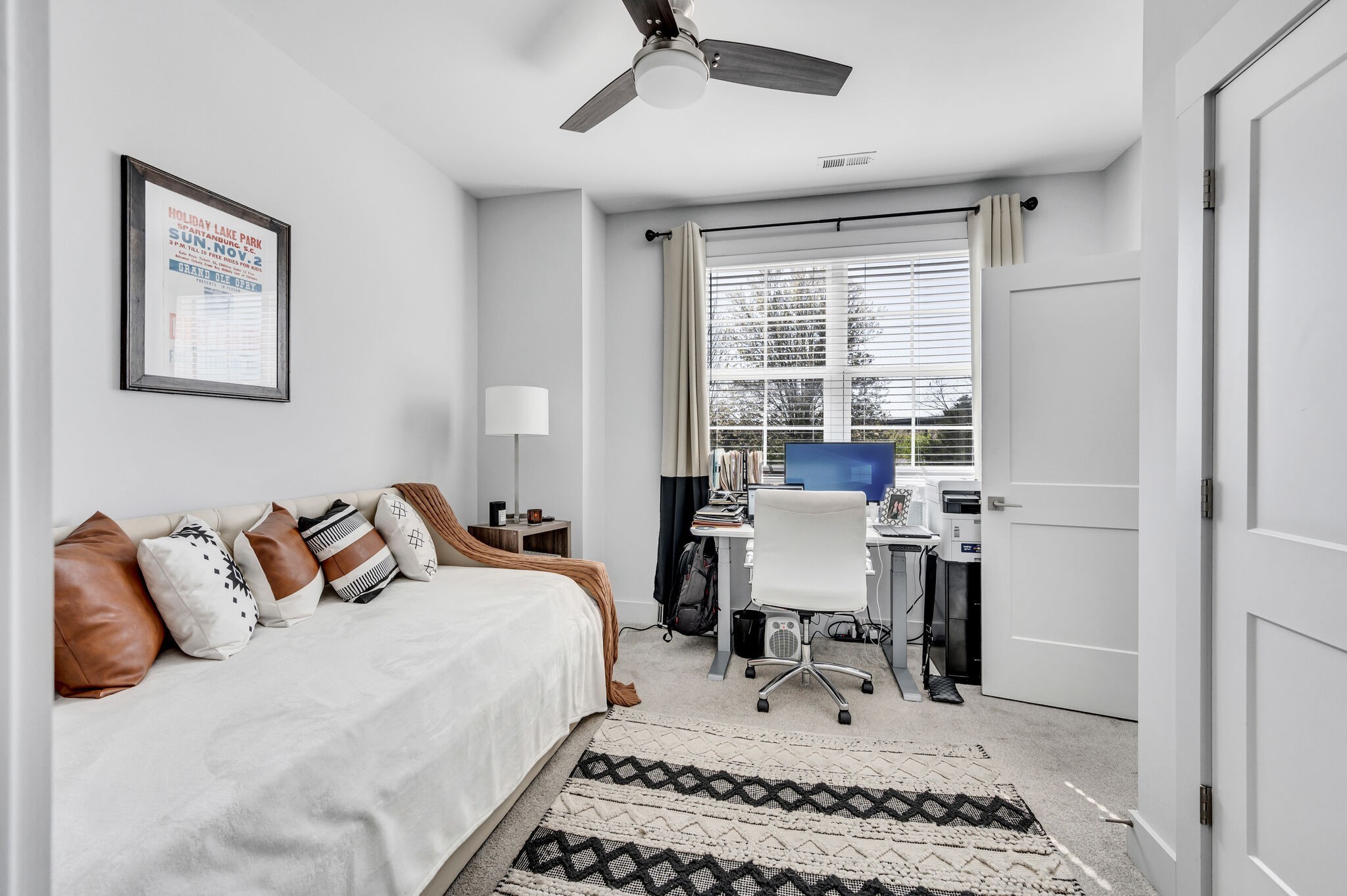 740 Inspiration Boulevard Madison, TN 37115 - Photo 29 of 55 a bedroom with a bed and a table