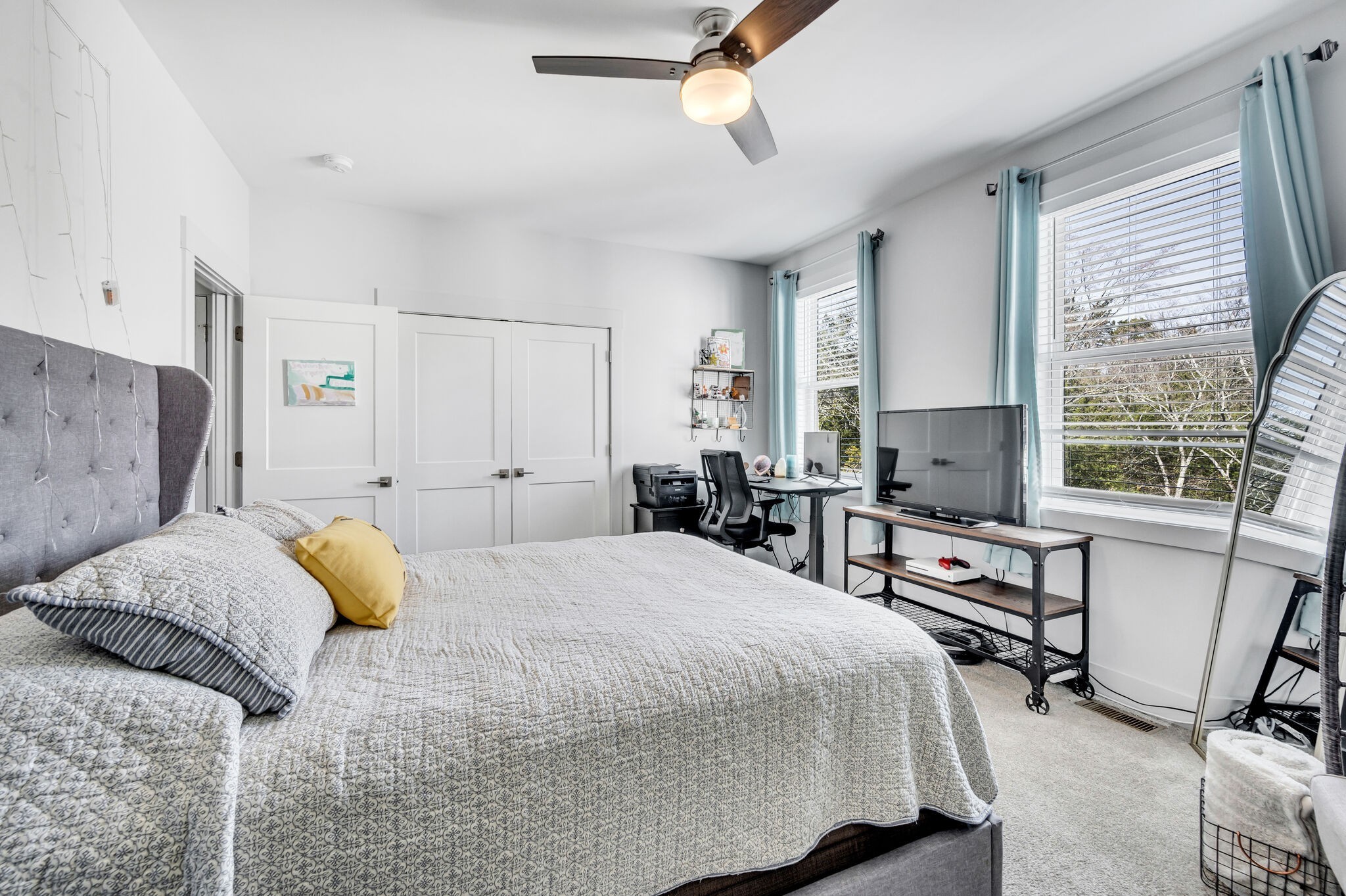 740 Inspiration Boulevard Madison, TN 37115 - Photo 36 of 55 a bedroom with a bed and wooden floor