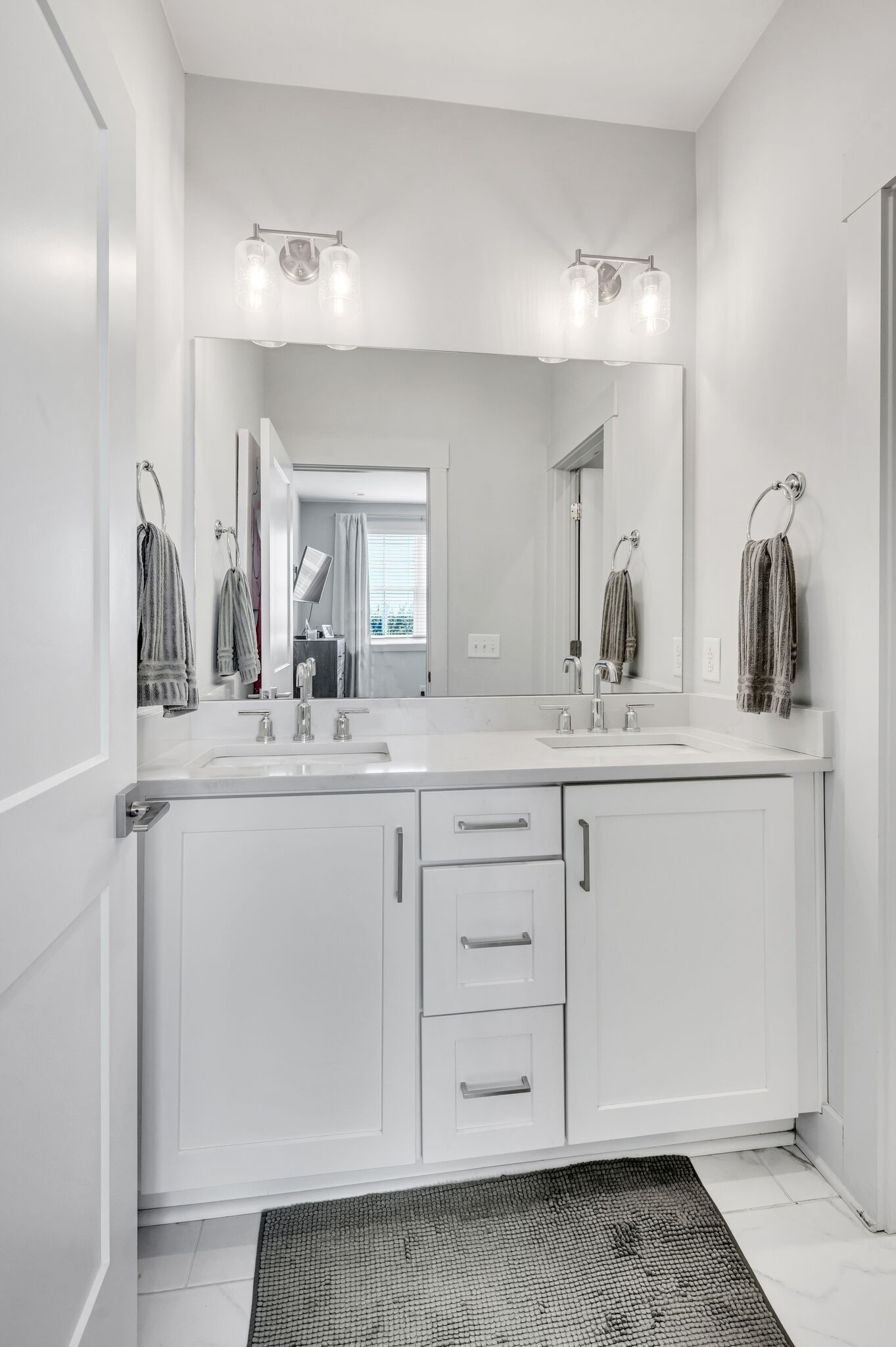 740 Inspiration Boulevard Madison, TN 37115 - Photo 44 of 55 a bathroom with a sink vanity and mirror