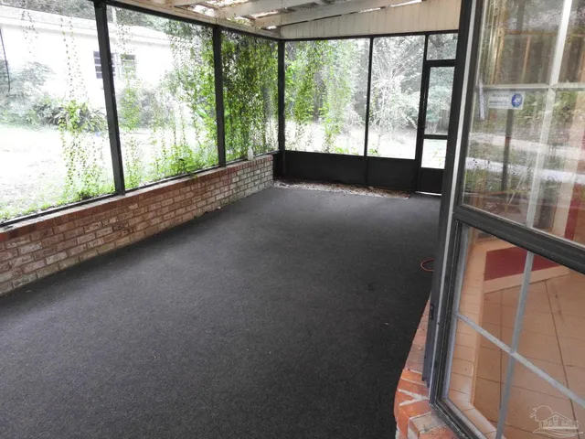 a view of a back yard of the house