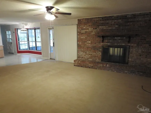 a view of a door and utility room