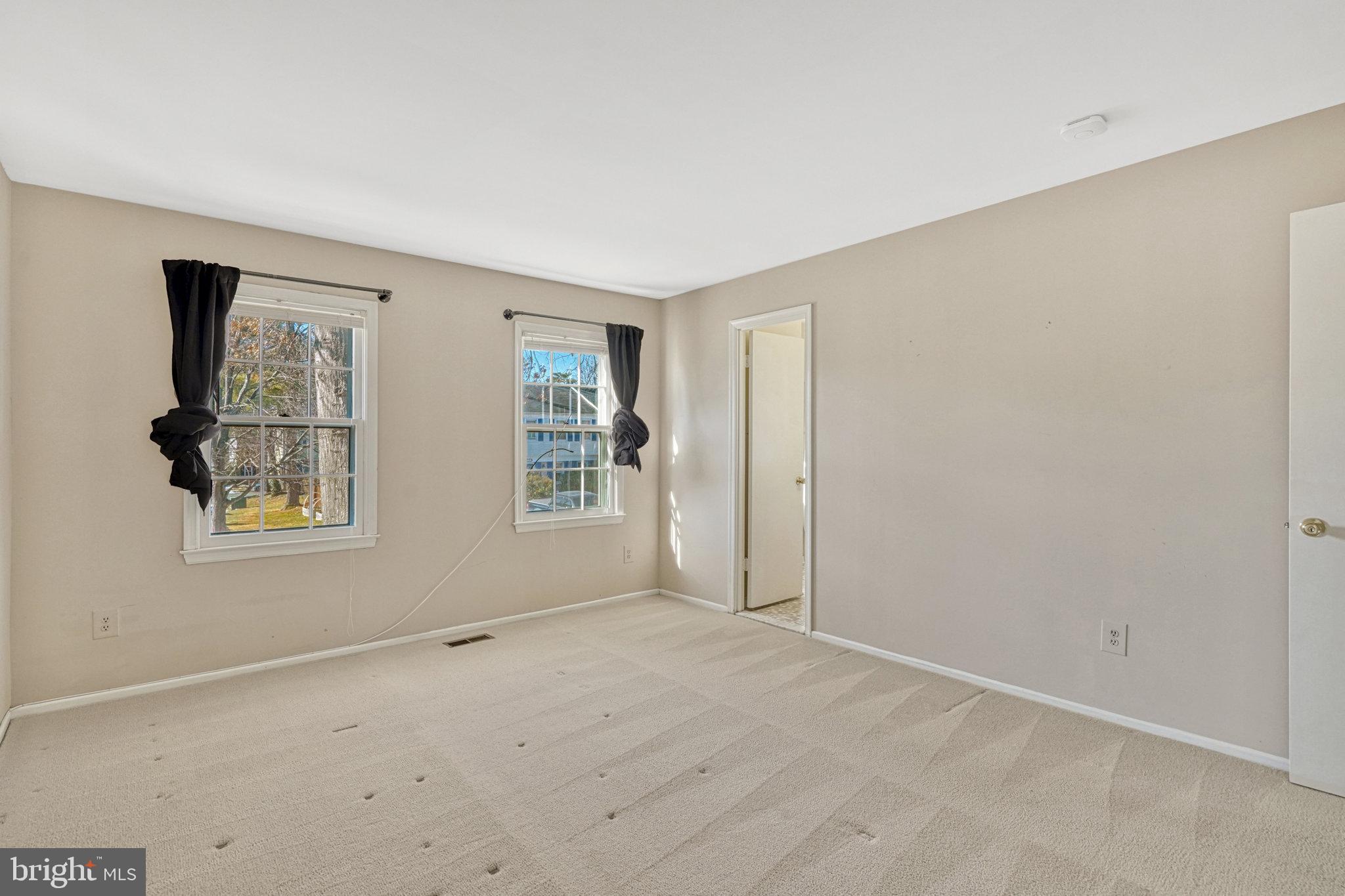5540 Kendrick Lane Burke, VA 22015 - Photo 21 of 40 an empty room with windows
