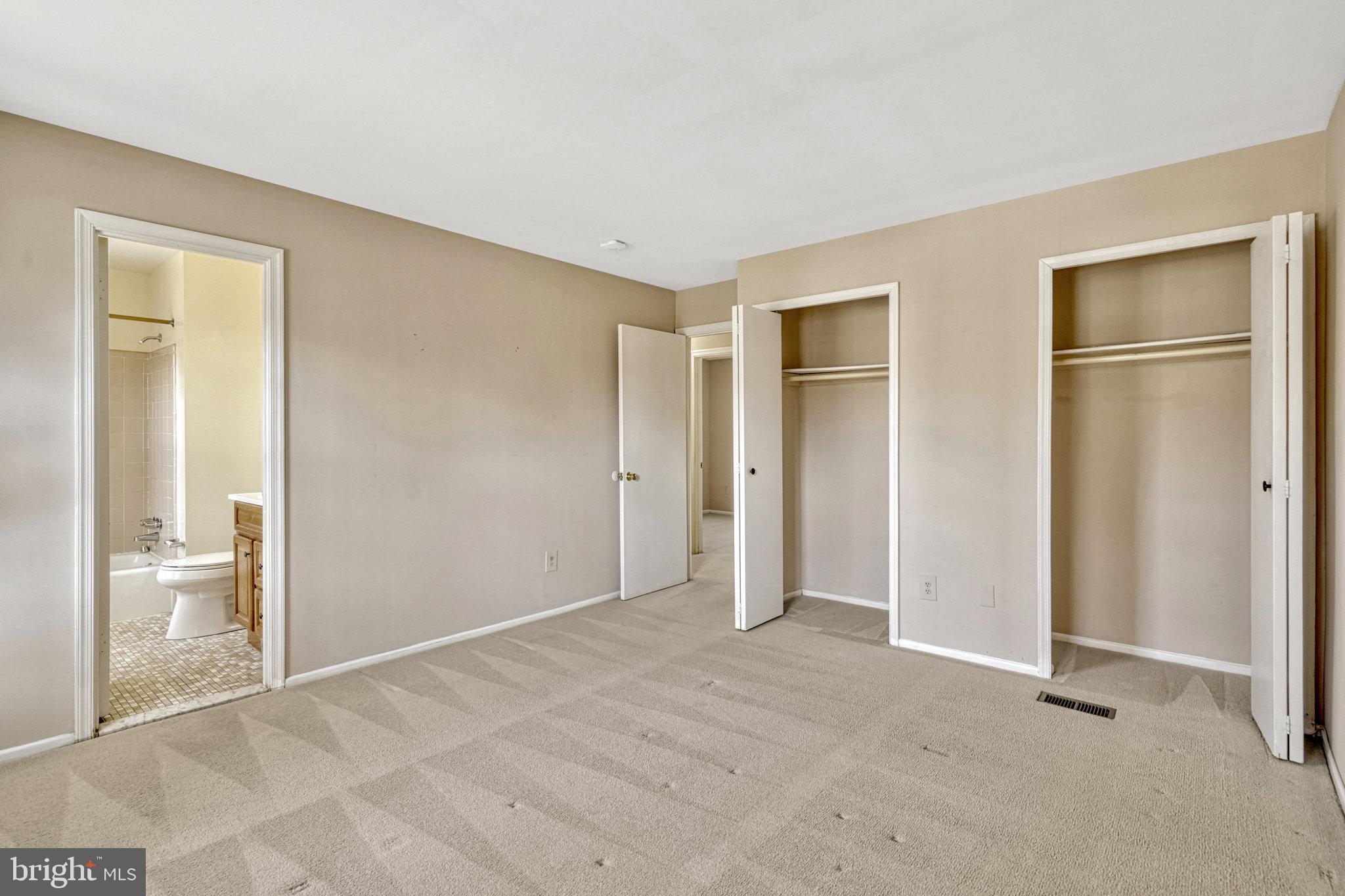 5540 Kendrick Lane Burke, VA 22015 - Photo 22 of 40 a view of an empty room with glass door and bedroom