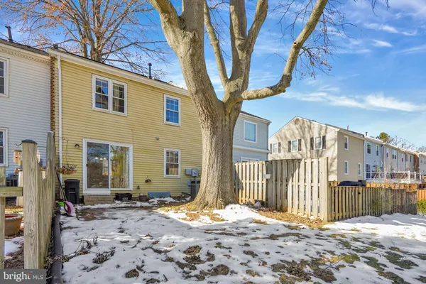 a view of backyard of a house