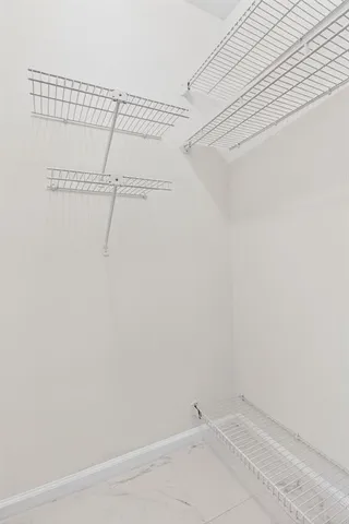 a view of a room with racks on the wall