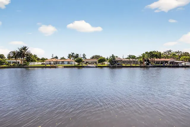 a view of an ocean with boats