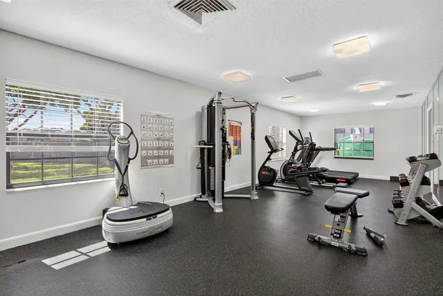 a view of a room with gym equipment
