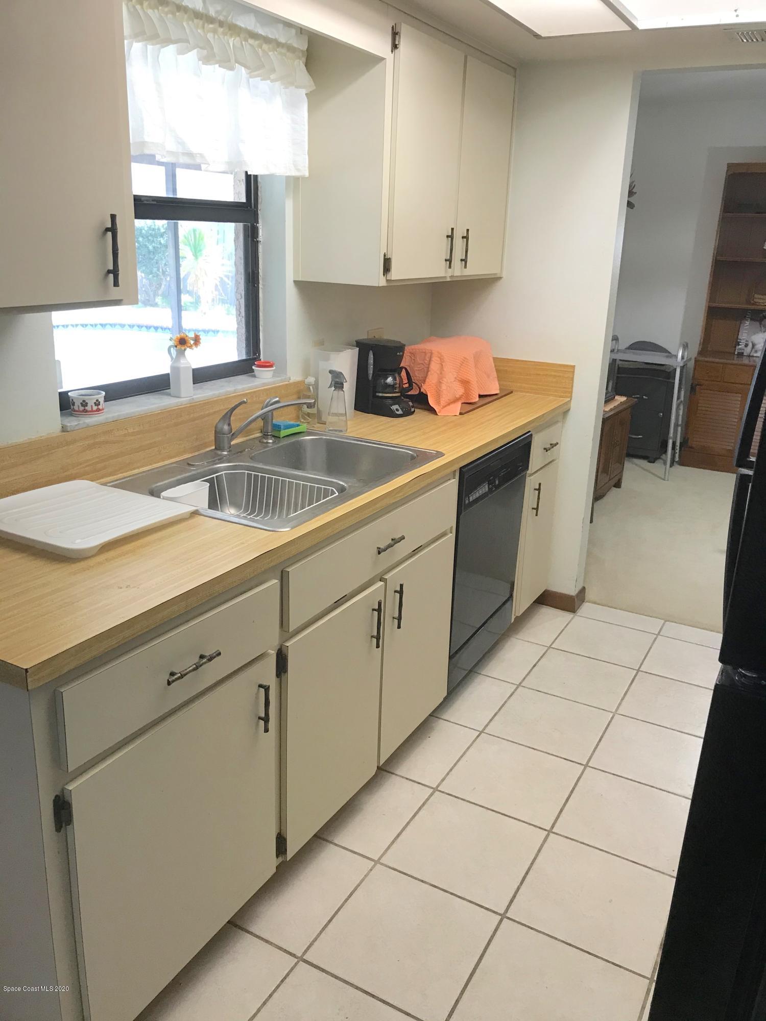 1704 Tuers Road Melbourne, FL 32935 - Photo 5 of 10 Kitchen2