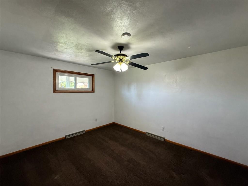 105 Ridgeview Drive Salix, PA 15952 - Photo 10 of 25 a view of wooden floor and a chandelier fan in a room