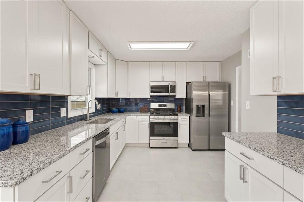 4309 Grandview Road Kansas City, MO 64137 - Photo 9 of 34