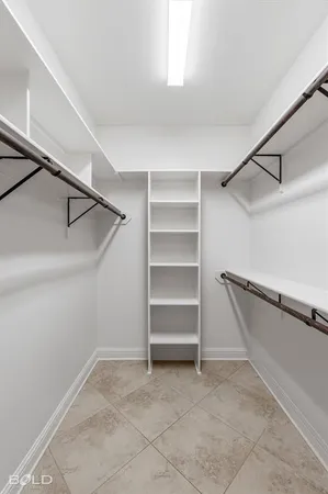 a view of an empty walk in closet