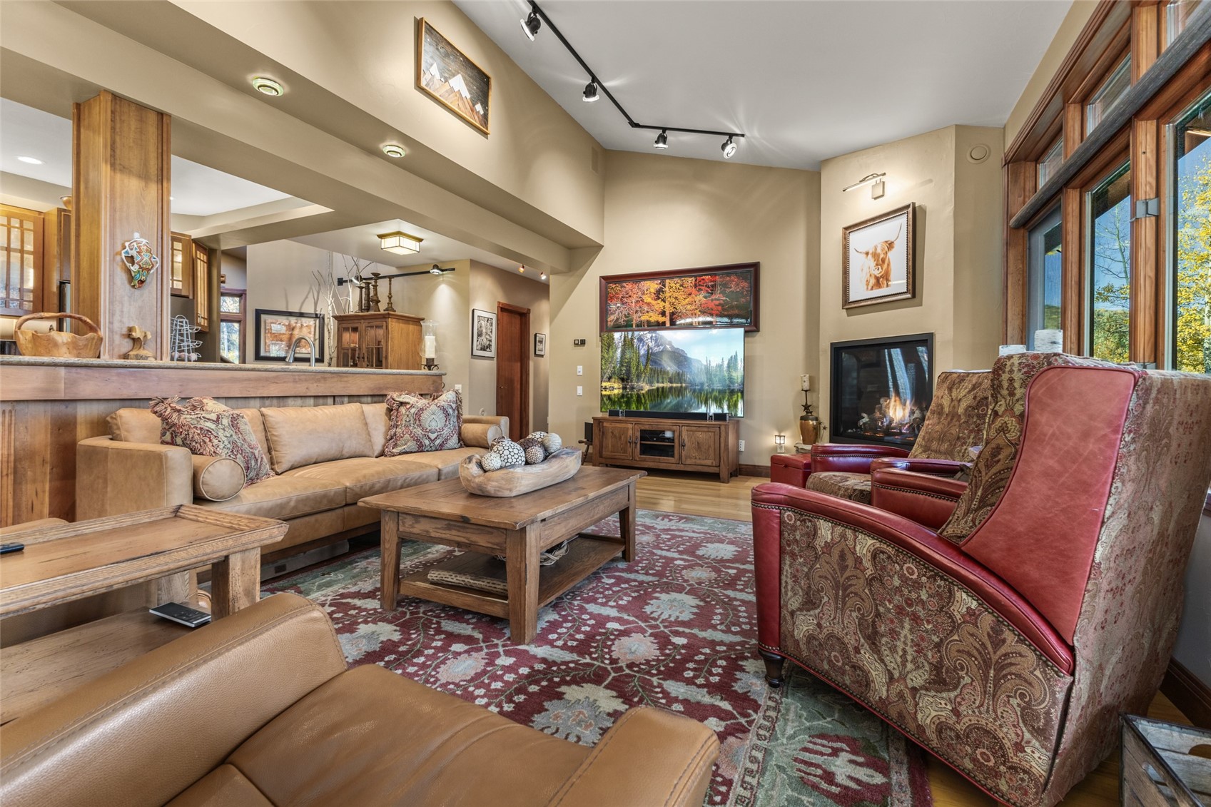 32350 Los Ranchos Road Oak Creek, CO 80467 - Photo 11 of 50 a living room with furniture fireplace and a flat screen tv