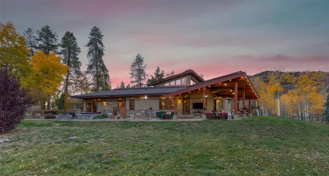 a living room with a couch and a table