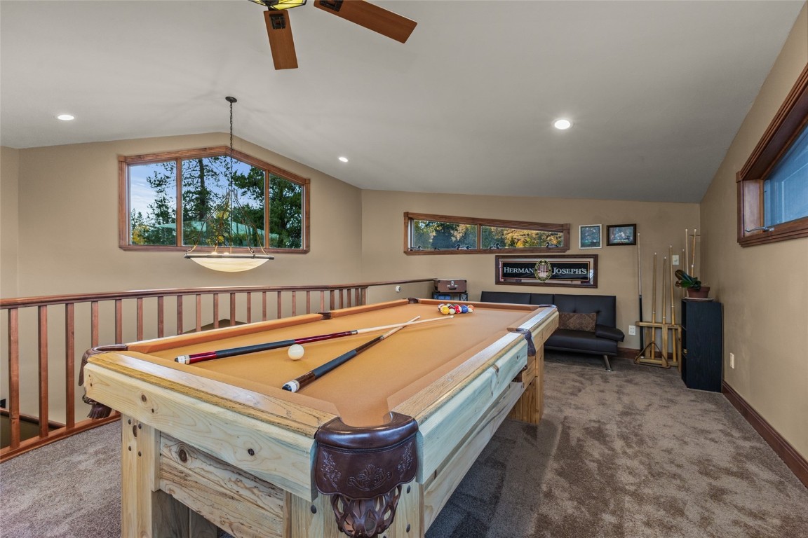 32350 Los Ranchos Road Oak Creek, CO 80467 - Photo 22 of 50 a room with furniture and a flat screen tv