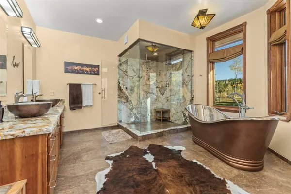 a view of a living room with a bath tub and a window