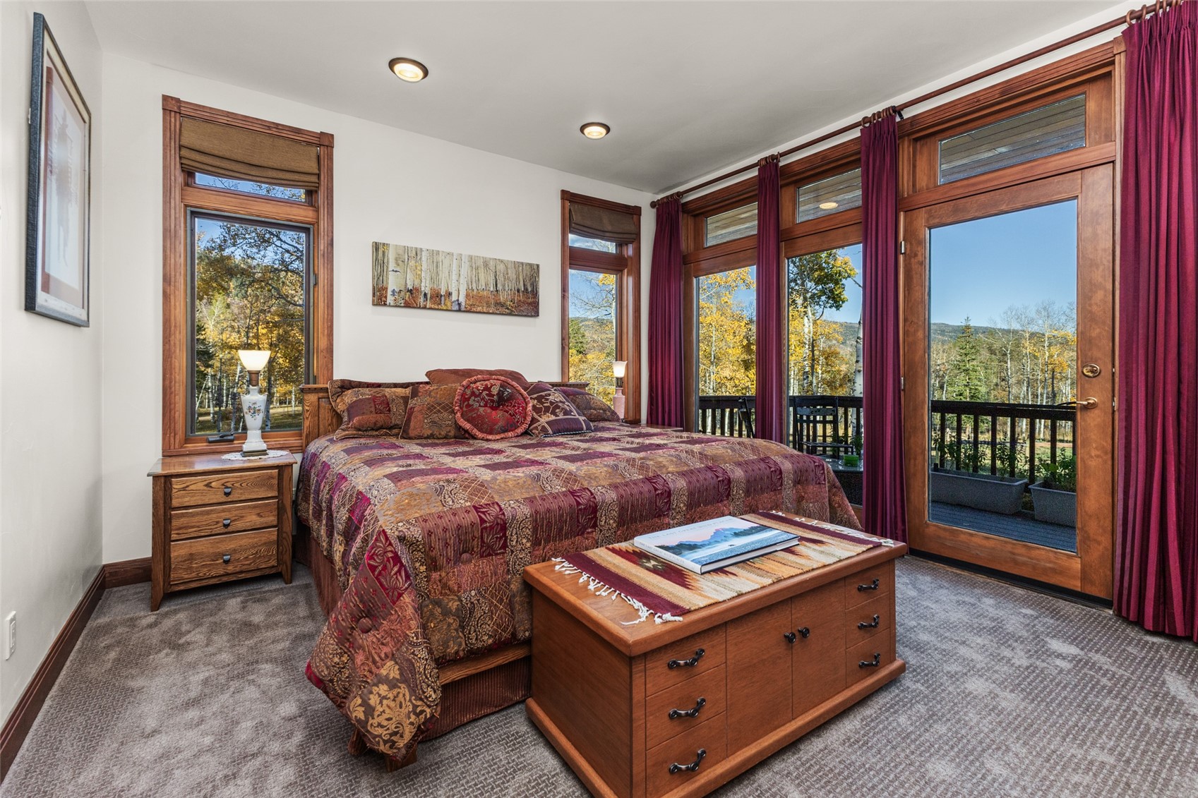 32350 Los Ranchos Road Oak Creek, CO 80467 - Photo 31 of 50 a bedroom with a bed and a large window