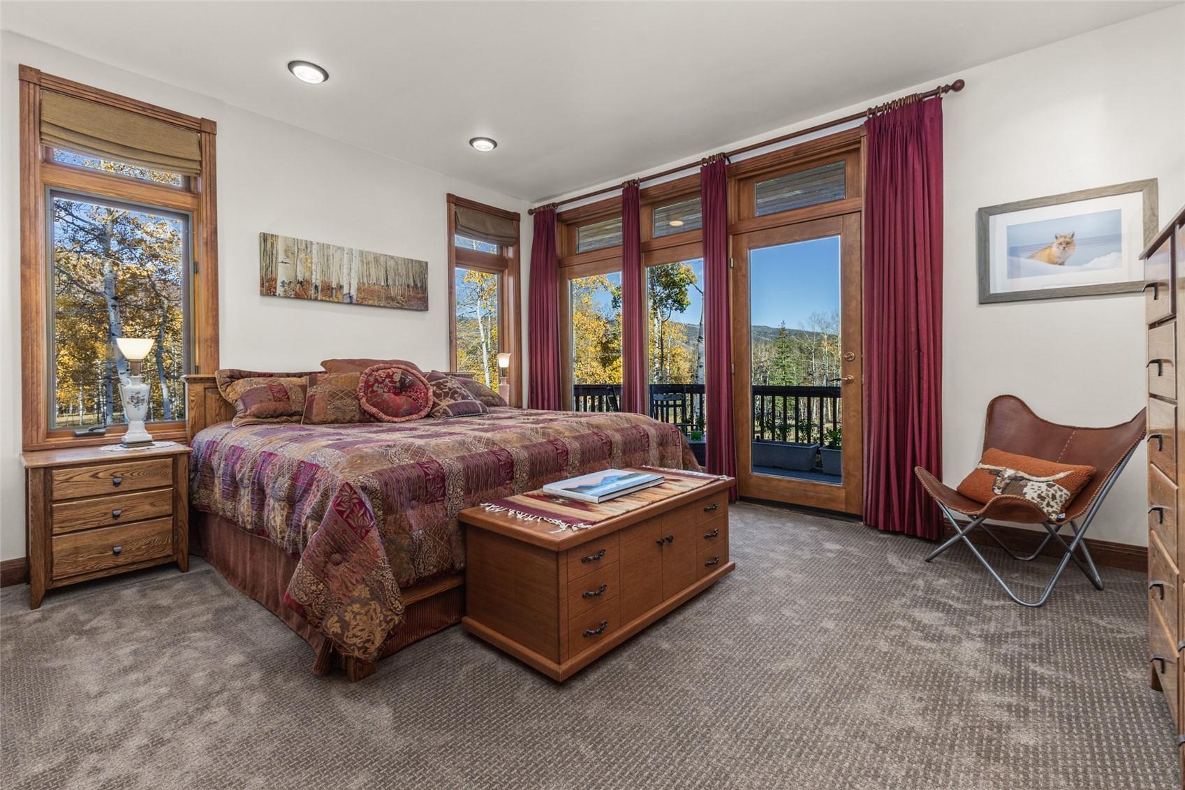 32350 Los Ranchos Road Oak Creek, CO 80467 - Photo 32 of 50 a bed room with a bed and a chair