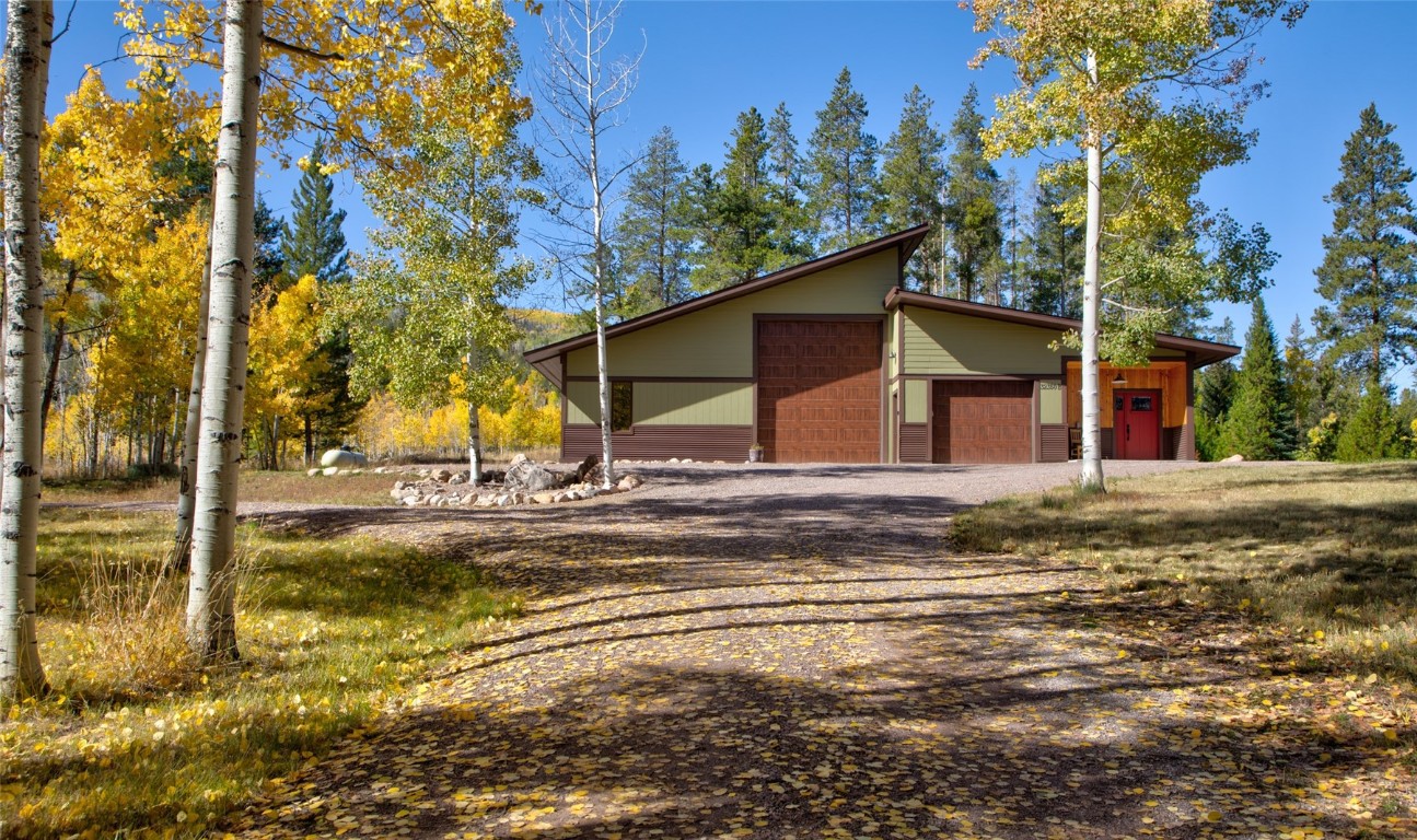 32350 Los Ranchos Road Oak Creek, CO 80467 - Photo 38 of 50 a view of a house with a yard