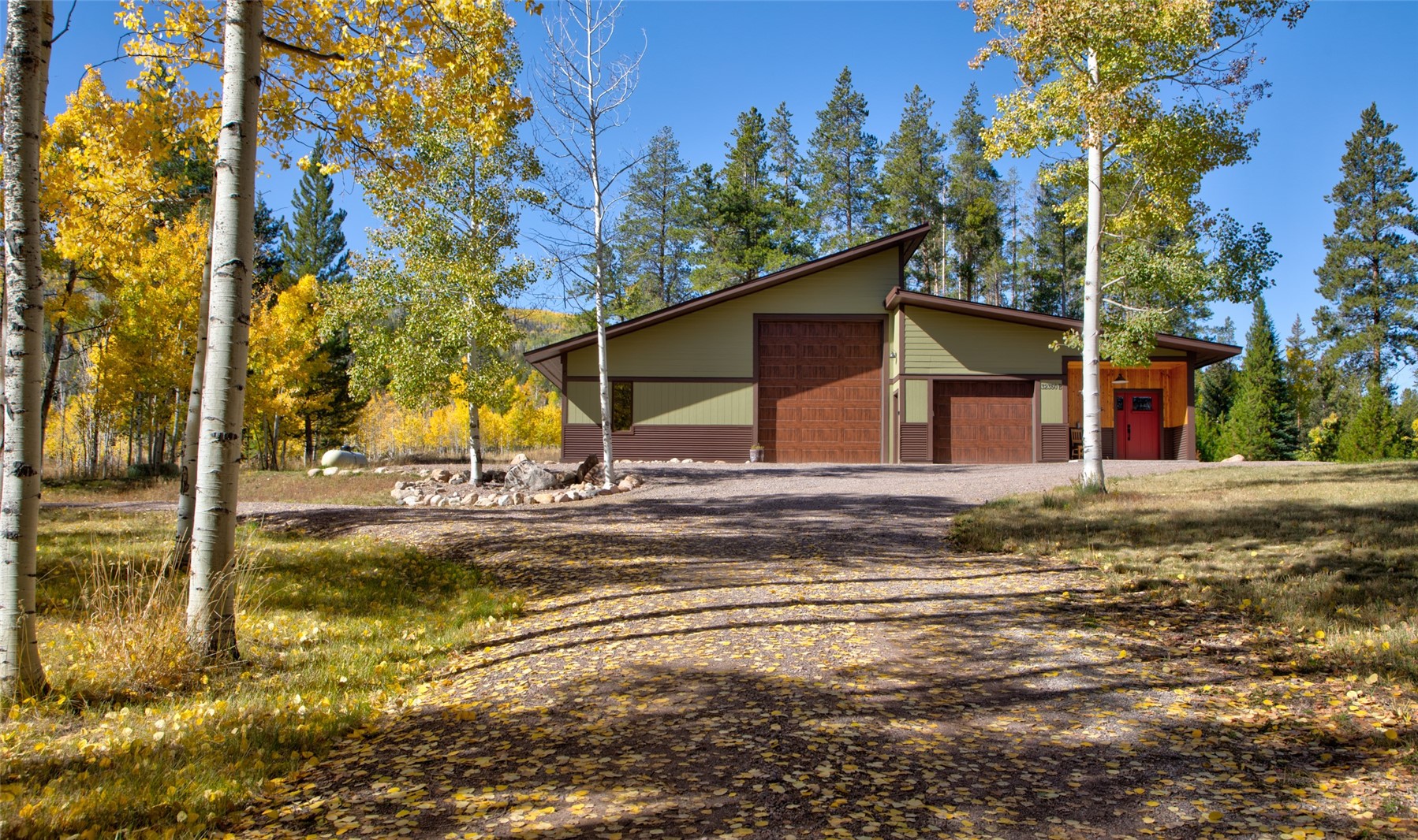 32350 Los Ranchos Road Oak Creek, CO 80467 - Photo 38 of 50 a view of a house with a yard
