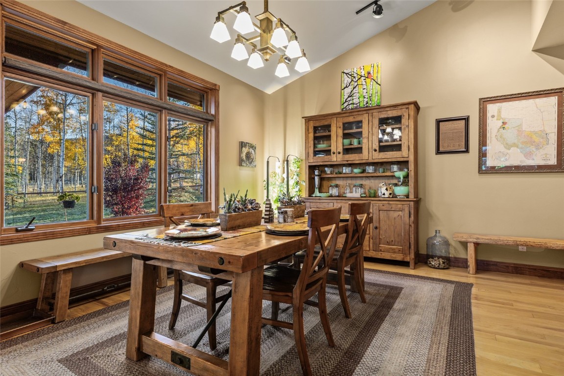 32350 Los Ranchos Road Oak Creek, CO 80467 - Photo 9 of 50 a view of a dining room with furniture window and outside view