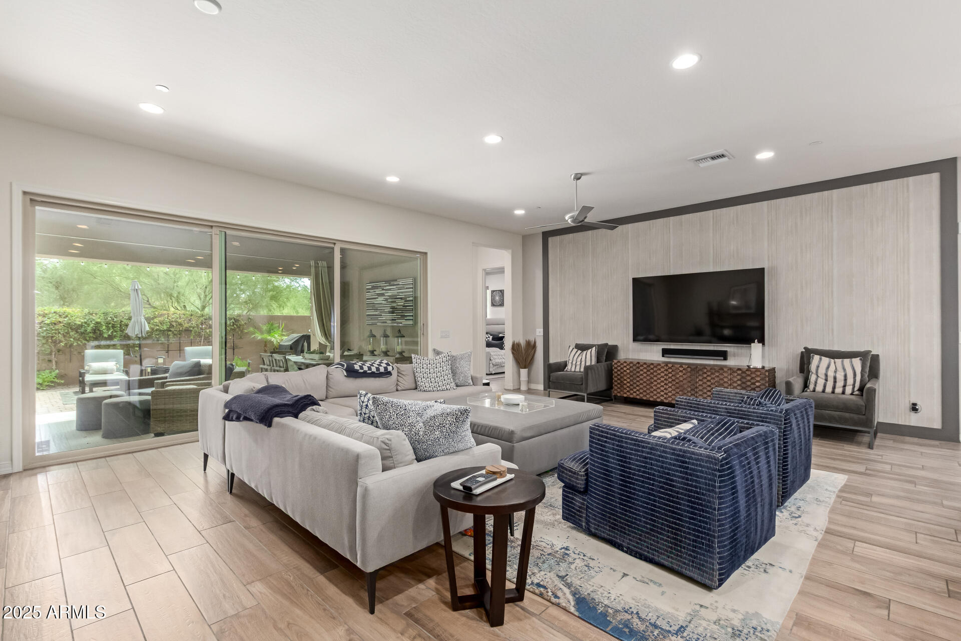 22943 North 73rd Way Scottsdale, AZ 85255 - Photo 16 of 49 a living room with furniture and a flat screen tv