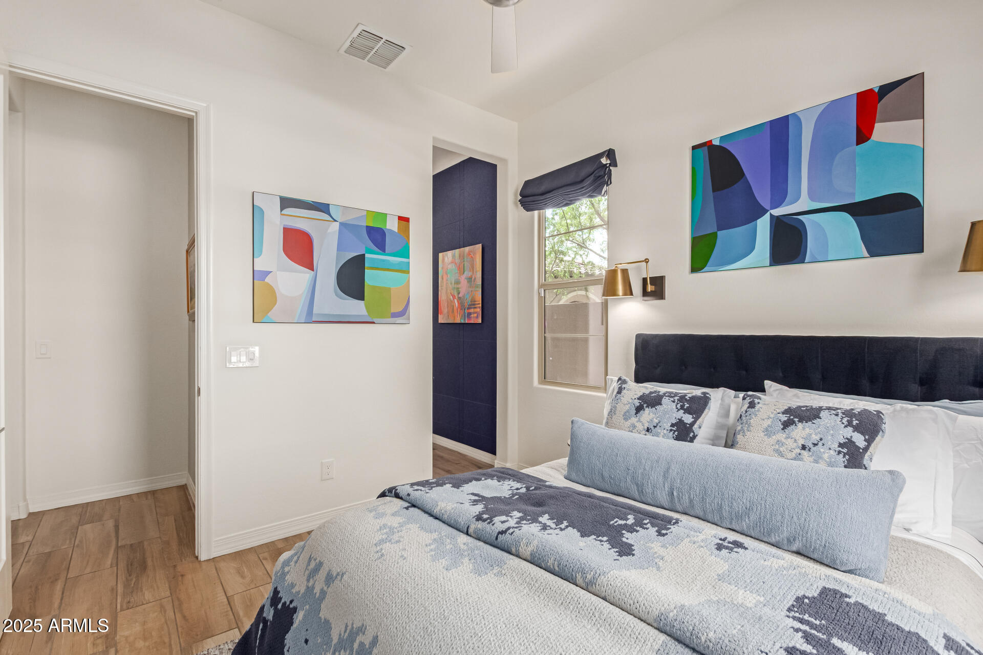 22943 North 73rd Way Scottsdale, AZ 85255 - Photo 24 of 49 a bedroom with a bed and a couch