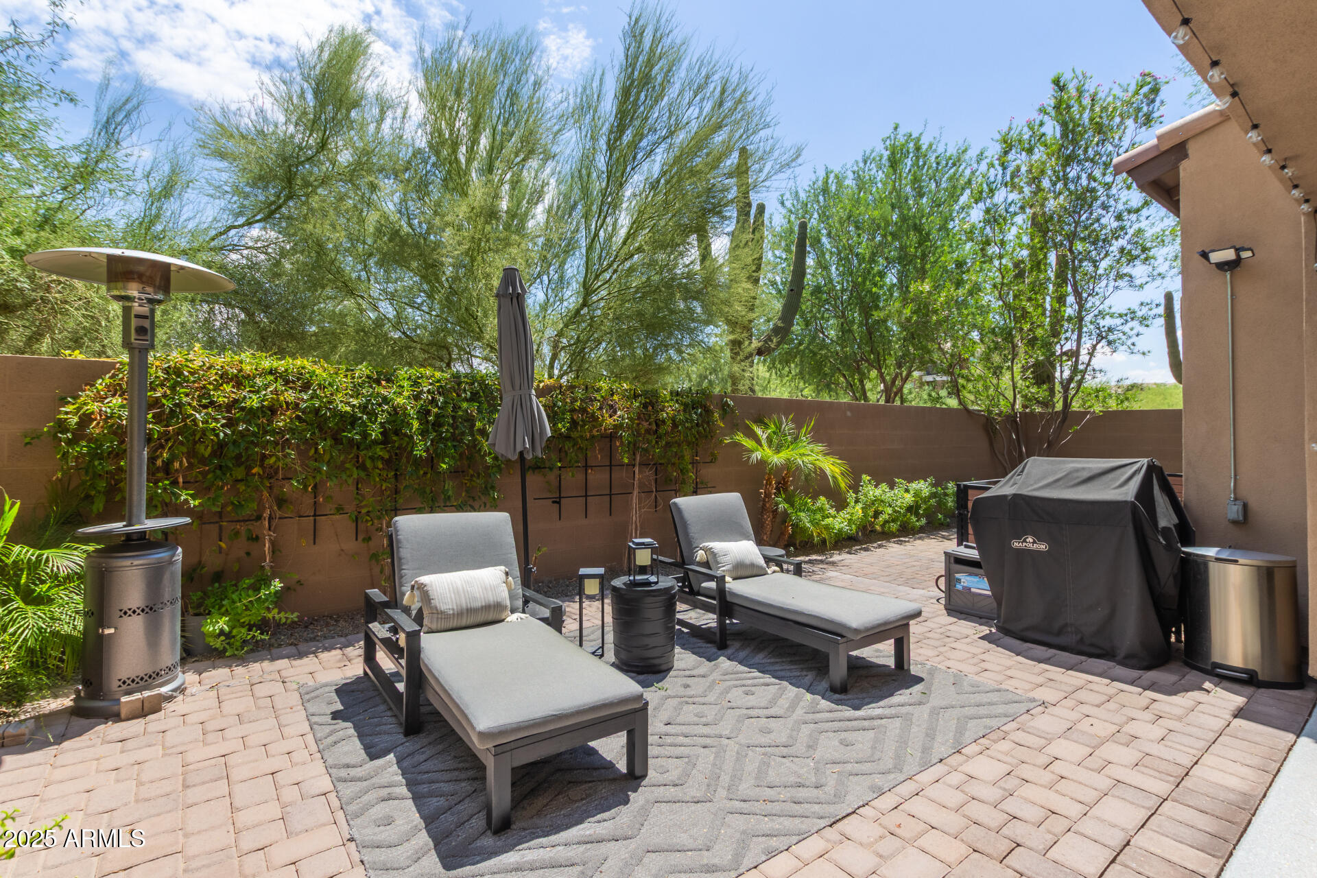 22943 North 73rd Way Scottsdale, AZ 85255 - Photo 29 of 49 a view of a patio with couches and potted plants