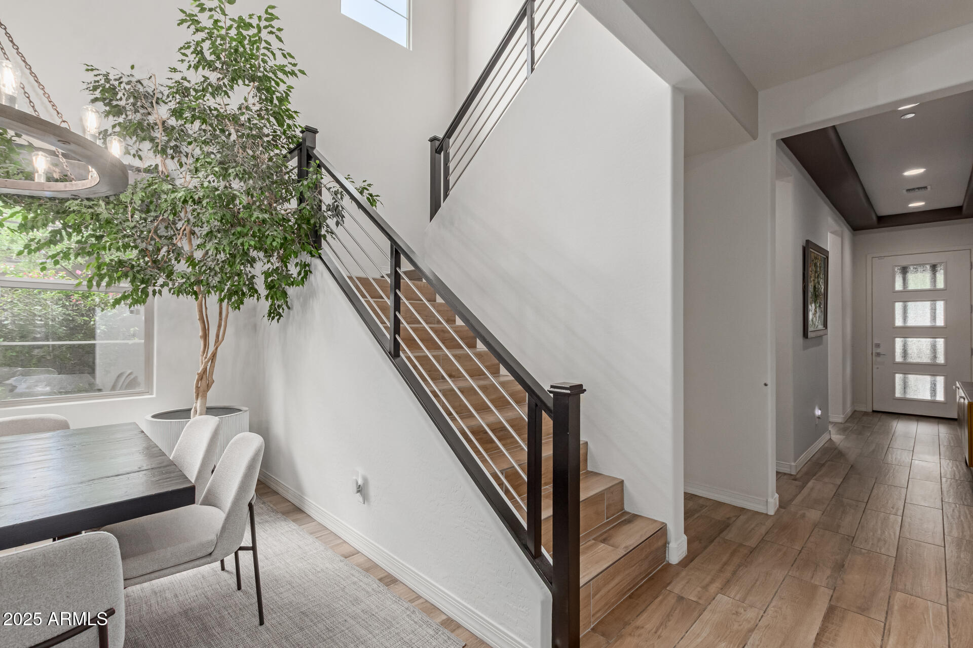 22943 North 73rd Way Scottsdale, AZ 85255 - Photo 30 of 49 a view of entryway with wooden floor and stairs