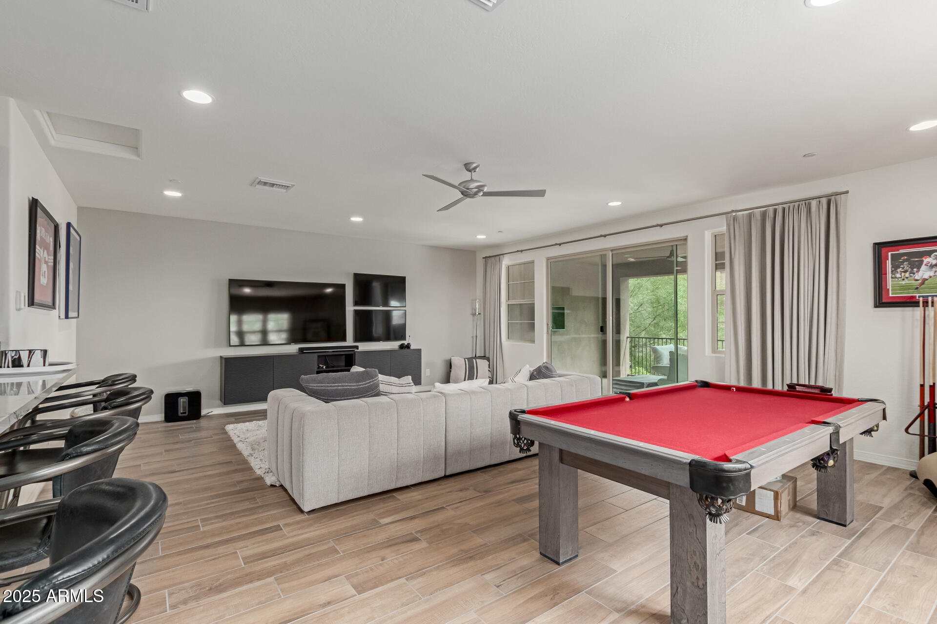 22943 North 73rd Way Scottsdale, AZ 85255 - Photo 31 of 49 a living room with furniture pool table and flat screen tv