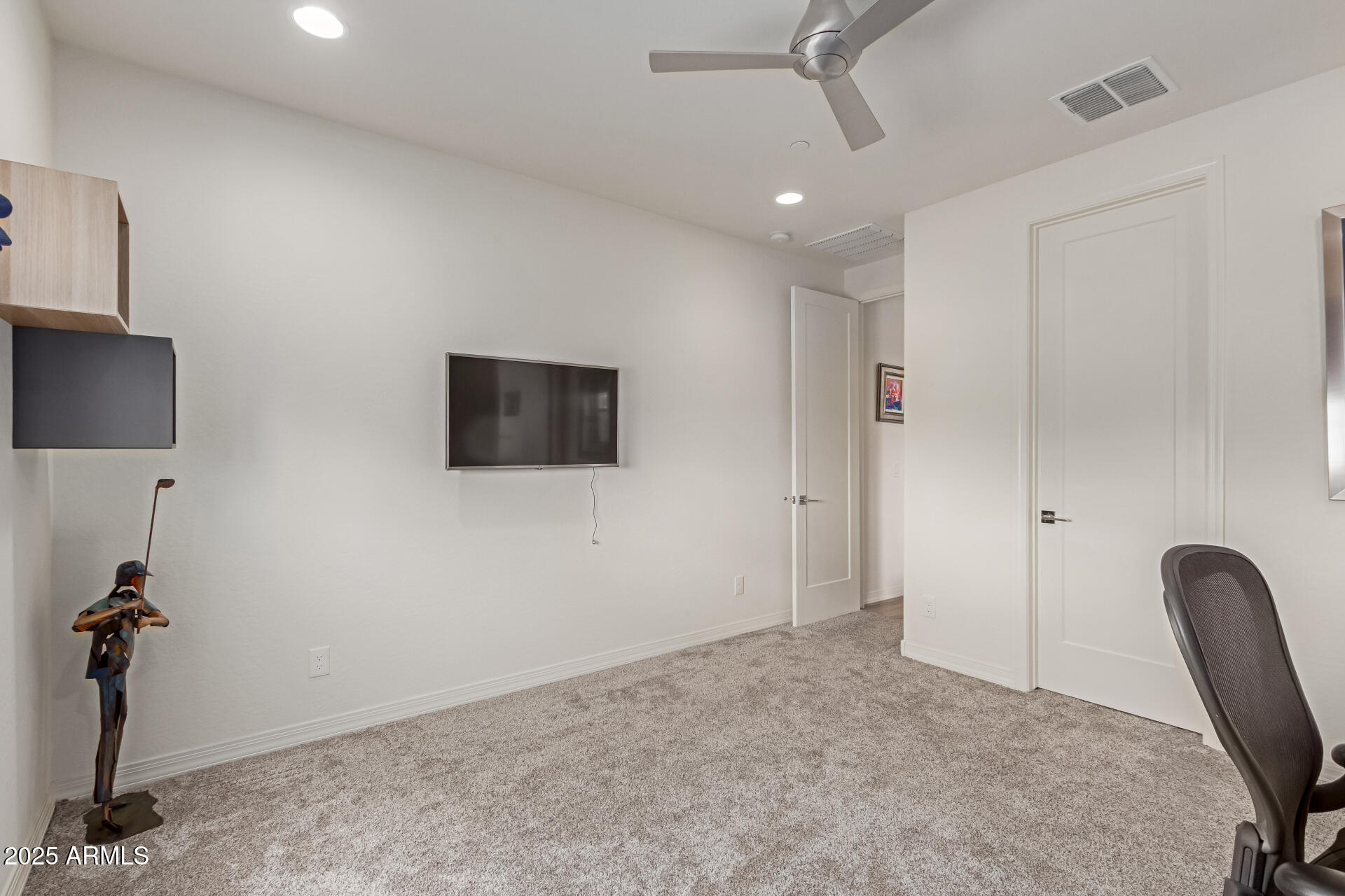22943 North 73rd Way Scottsdale, AZ 85255 - Photo 38 of 49 a view of a livingroom with furniture and a flat screen tv