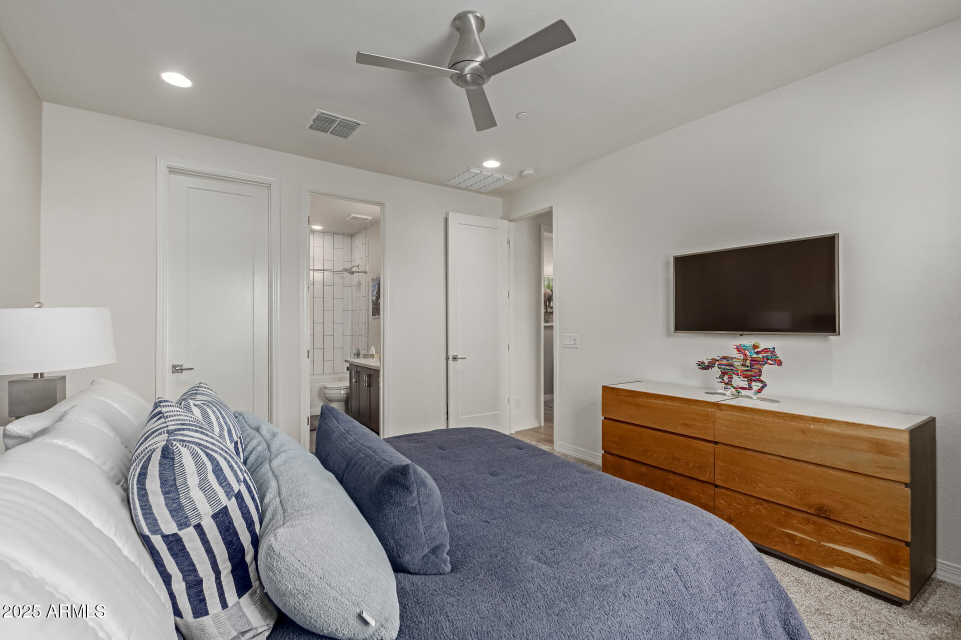 22943 North 73rd Way Scottsdale, AZ 85255 - Photo 41 of 49 a bedroom with a bed and a flat screen tv