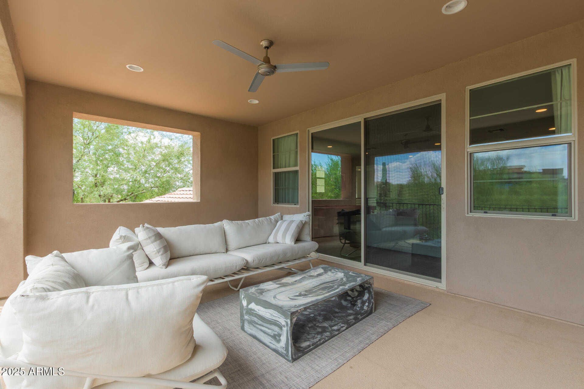 22943 North 73rd Way Scottsdale, AZ 85255 - Photo 44 of 49 a living room with furniture and a large window