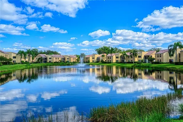 a view of a lake with a city