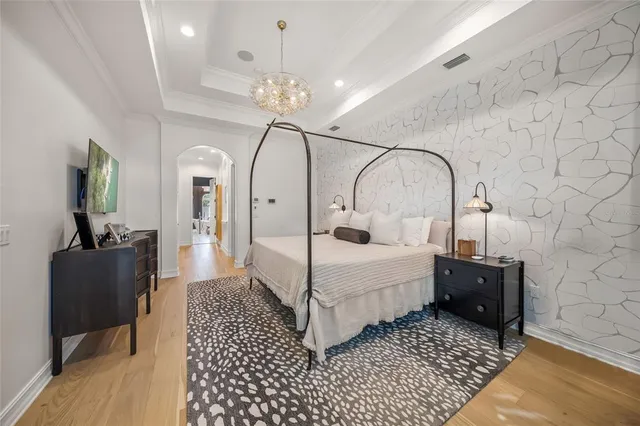 a bed room with a bed and a window