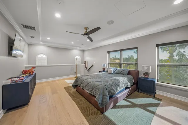 a room with stainless steel appliances kitchen island granite countertop furniture and a kitchen view