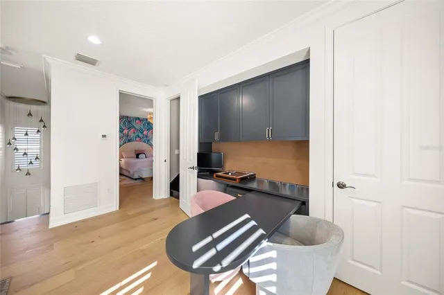 a front view of a house with a yard and a garage